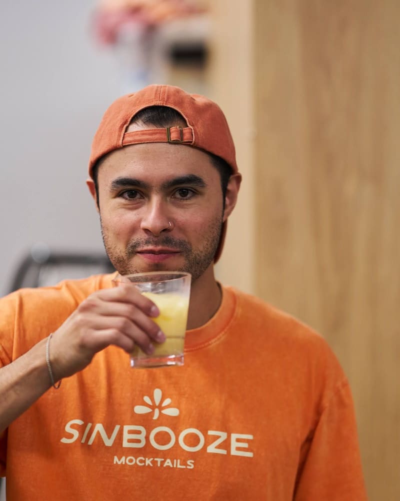 Sin Booze founder Aldo Covarrubias raises a mocktail