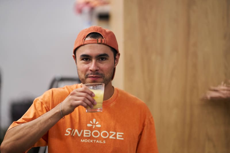 Aldo Covarrubias raises a mocktail